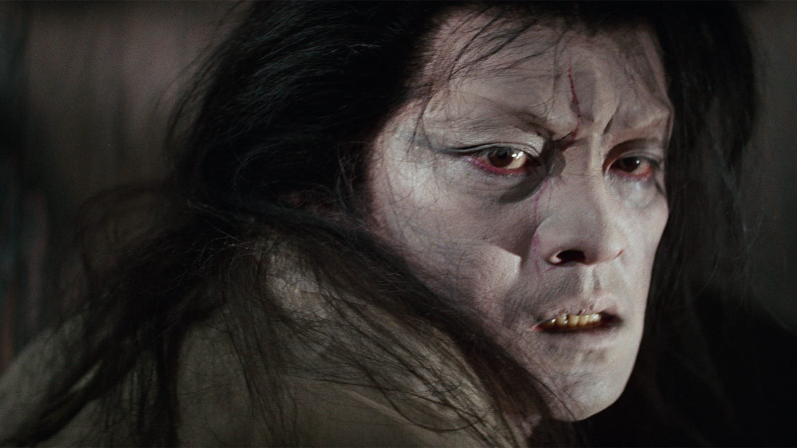 The samurai at the end of “The Black Hair,” his face grey and lined, his long hair wild around it