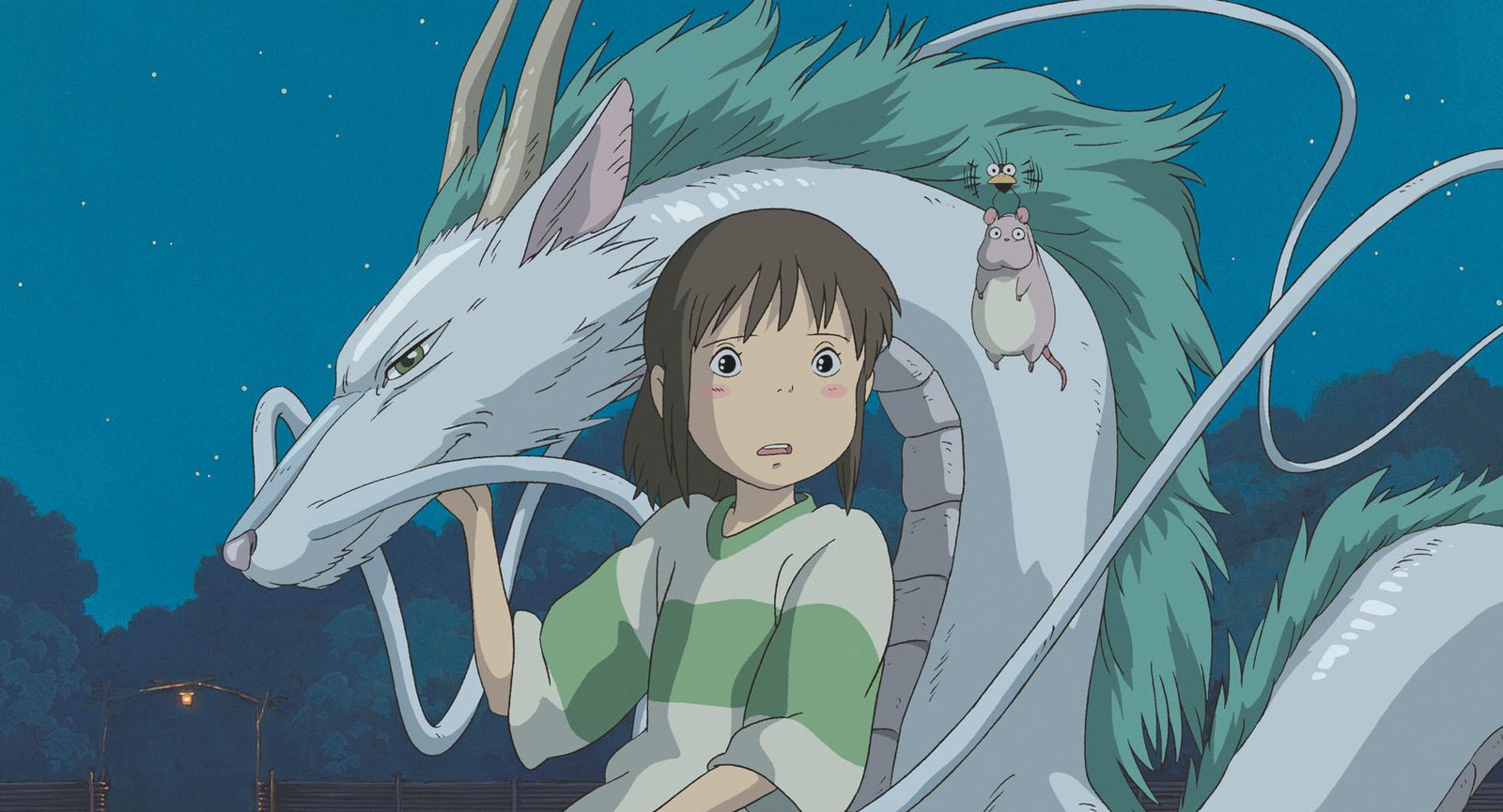 Chihiro, a girl in a green-and-white top, sits in front of Haku, a long white dragon with a green mane, against a night sky