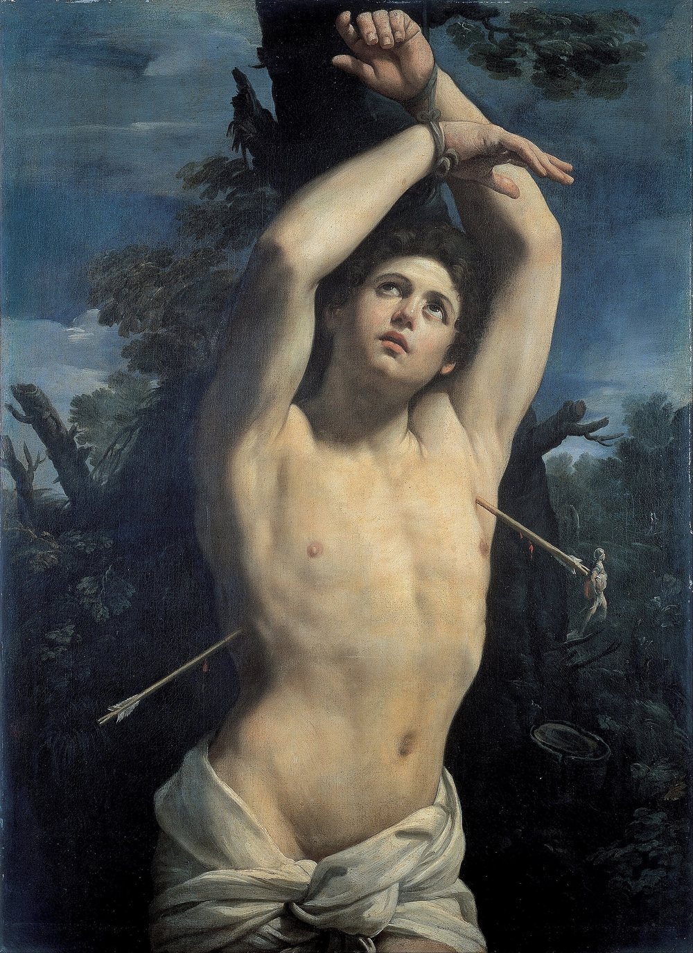 A nearly naked young man, his arms bound above his head to a tree, an arrow in his side, his eyes turned up to the sky